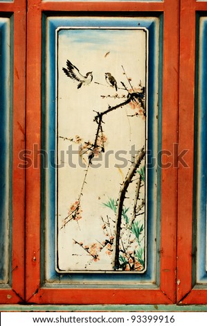Antique Chinese art painting on wood wall of ancient chinese temple