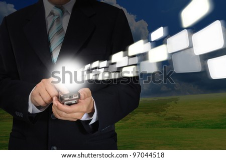 Hand of Business Man Pushing touching screen of mobile smart phone as information Technology concept