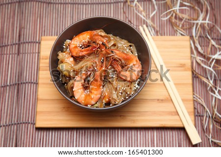 Pasta and shrimp. Noodles with seafood. Noodles and shrimp in teriyaki sauce or oyster sauce.