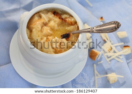 Hot soup with croutons and cheese. Pea soup. Onion soup. Soup. Food style