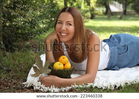 Girl with tangerines. Vintage tangerines. A woman of 30 years of fruit.