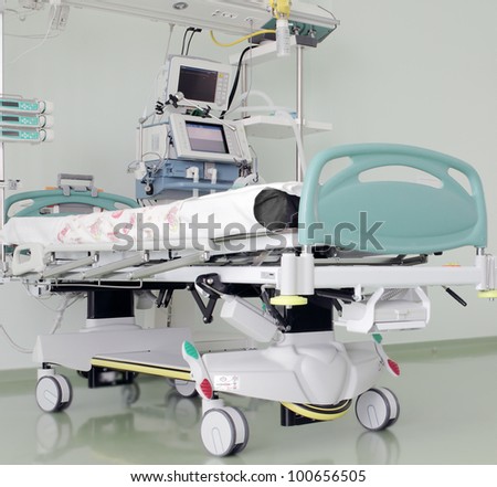 place in the intensive care unit ready to receive patients Medical multifunction bed artificial respiration apparatus monitor panel of medical gases place in the intensive care unit ready to receive patients Medical multifunction bed artificial respiration apparatus monitor panel of medical gases