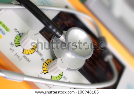 stethoscope on artificial lung ventilation apparatus. photo
