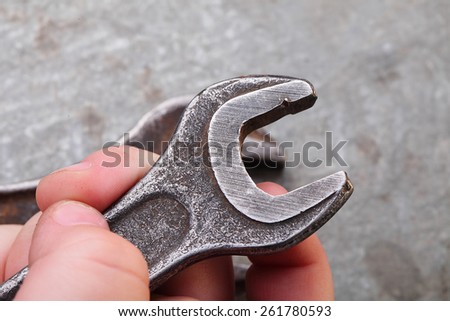 Wrench in child\'s hands