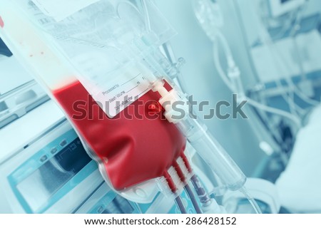 Blood for transfusion on a background of intensive care units equipment