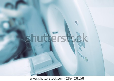 Medical examination using modern CT scanner in hospital