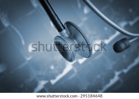 Stethoscope on the background of CT scan image