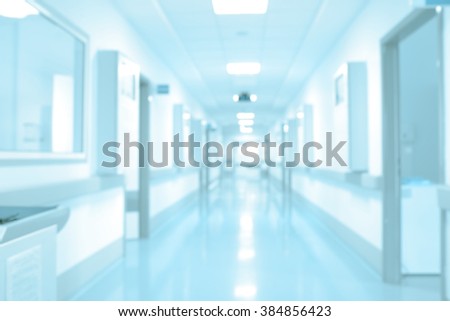 Long hospital hallway, background unfocused.