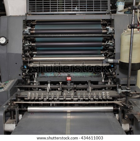 Old offset machine in printing workshop.