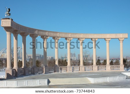 The photo Colonnade in one of parks of capital of Kazakhstan, symbolizes a family, marriage, a birth of children.