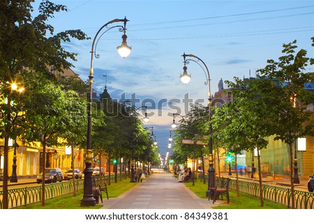 photo brightly lit alley in the city