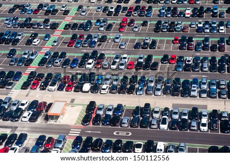 Aerial view of airport car crowded parking lot