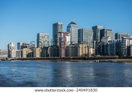 Skyscrapers of Canary Wharf seen from the river Thames in London