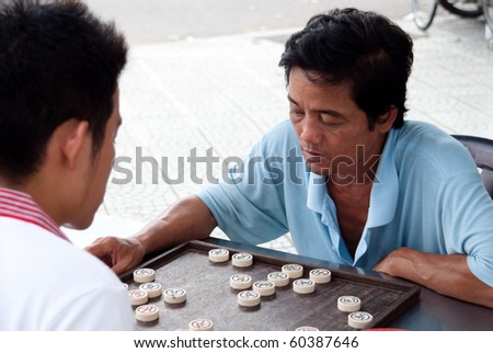HUE, VIETNAM - SEPTEMBER 4: Unidentified man plays chess in Hue, Vietnam on September 4, 2010. The chairman of the Vietnam Chess Federation said the government spends US$3 million a year to promote the game