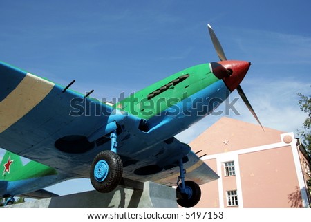 Historical monument. Propeller-driven war-plane.