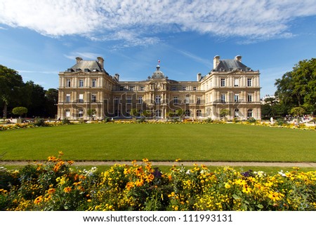 Color DSLR image of the Palace in the Luxembourg Gardens, Paris, France, a popular Left Bank, Latin Quarter park with flowers blooming; in horizontal orientation with copy space for text