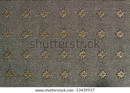 Color DSLR image of green and brown textured woven outdoor jacquard fabric; in horizontal orientation