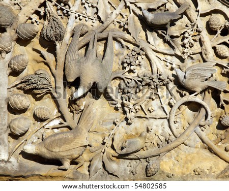 Carvings in concrete of birds in the trees on the Bethesda Terrace in Central Park, New York City; in horizontal orientation