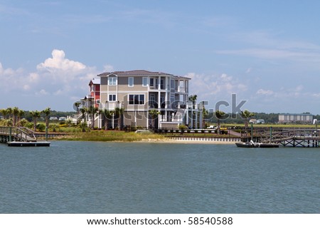 Luxury beach house on the intercoastal waterway in North Carolina in horizontal orientation; with copy space for text