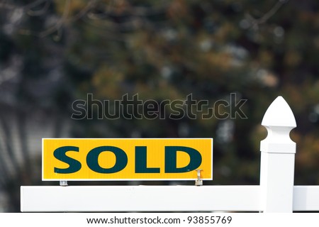 Sold sign on real estate; in horizontal orientation with copy space for text