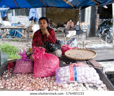 SUMATRA, INDONESIA - AUG 11 : Local people sell local vegetables at the market on Aug 11, 2011 in Medan, Sumatra. Medan is the third largest city in Indonesia.