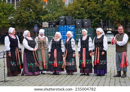 OSLO, NORWAY - SEPT 20: Unidentified musicians garbed in period costumes performing on the square on Sept 20, 2014 in Oslo, Norway