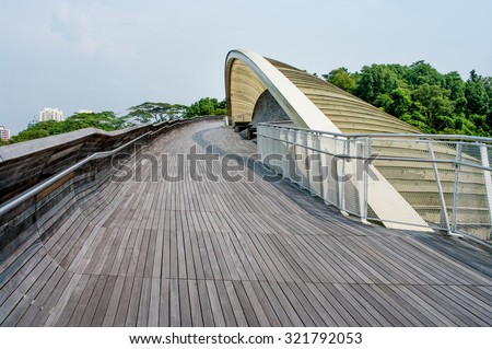 SINGAPORE-AUG 23: Henderson Waves is the highest pedestrian bridge in Singapore. It was built to connect the two hills of Mount Faber and Telok Blangah Hill. August 23, 2011 in Singapore