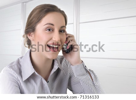 Business woman  laughs and talking on the phone