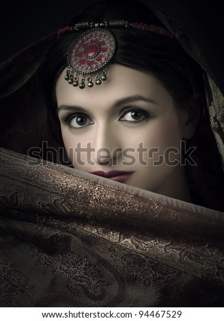 Beautiful brunette portrait with traditional indian costume