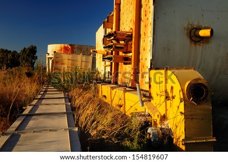 Rusty structure at abandoned industrial zone. Israel.