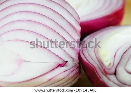 Red, also called purple, onion cut to pieces and ready for cooking.