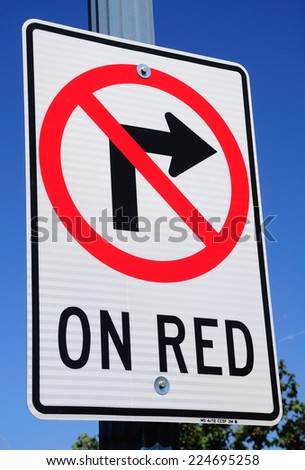 Traffic sign prohibiting right turn on red traffic light.