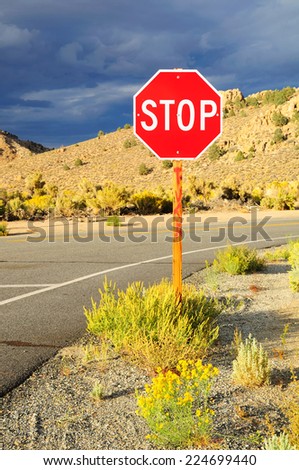 Prohibitory stop traffic sign under cloudy sky. Nevada State. USA.
