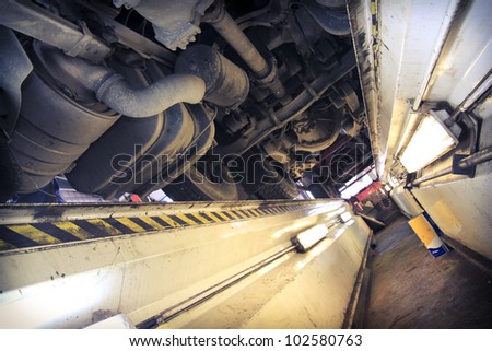 underneath of a truck as seen from vehicle inspection trench