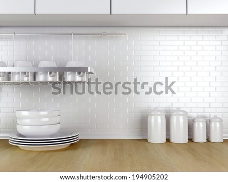 Kitchenware on the wooden worktop. White kitchen design.