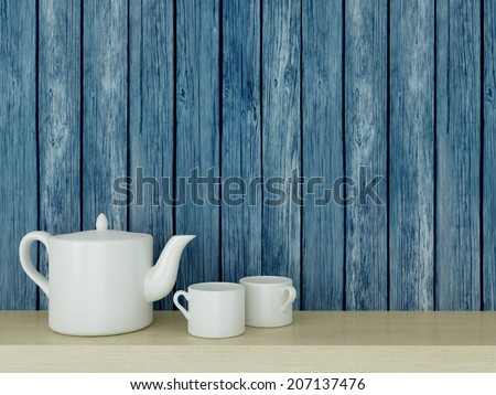 White ceramic kitchenware on the wooden shelf in front of blue old wood wall.