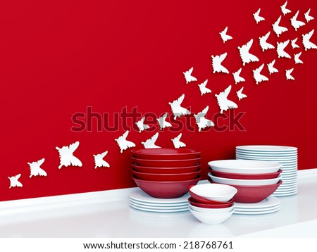 Modern white and red kitchen design. Ceramic kitchenware on the shelf. Butterfly decor on the wall.