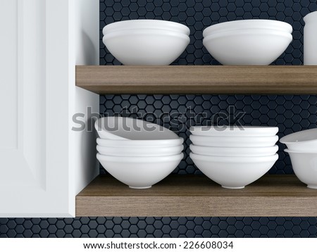 Fragment of interior of modern black and white kitchen. Kitchenware on the wooden shelves.