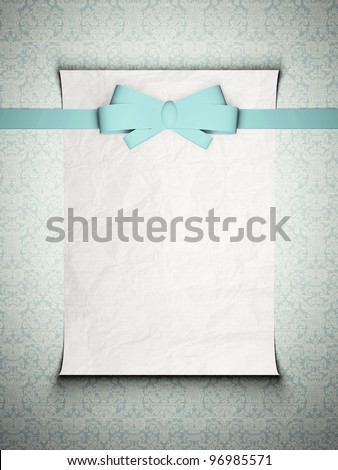 stock photo Wedding invitation card with blue ribbon in front on the 