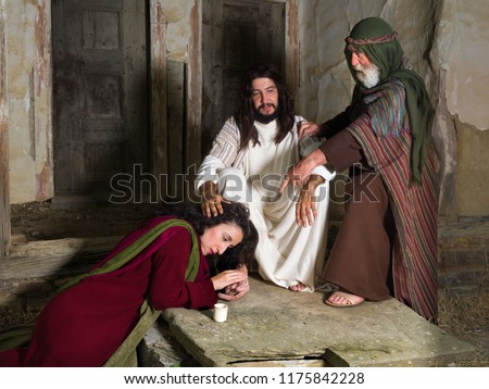 Mary of Bethany crying of shame and anointing Jesus' feet, while Judas is protesting against the waste