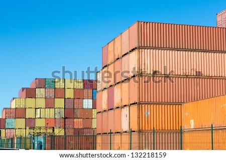 Stacked containers in the container terminals of Antwerp world port in Belgium - all brands and logos have been removed