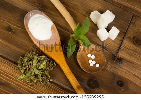 Real sugar lumps and stevia in powder dried and tablet form