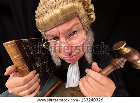 Grumpy Old Judge In Extreme Wide Angle Closeup With Hammer And Wig