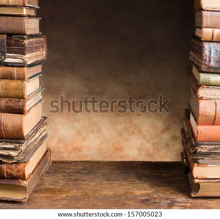 Border Frame Image Of Two Stacks Of Antique Books