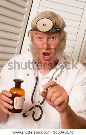 Vintage doctor telling the patient to open his mouth for a big pill