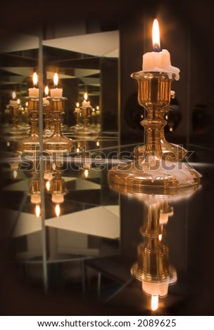 Three mirrors reflecting just one candle - which one?
