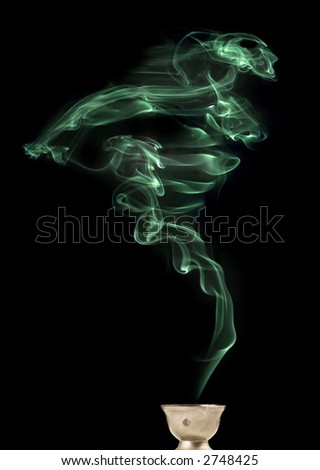 Green wisp of smoke, real smoke (not computer rendered) that looks like a ghost