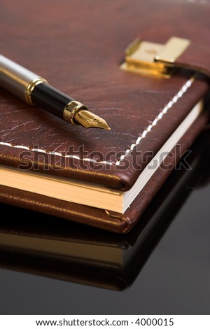 Pen on a closed diary