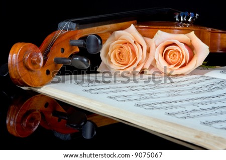 Sheet music of the Wedding March; with roses and violin
