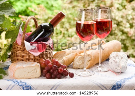 Country life setting with wine and fruit